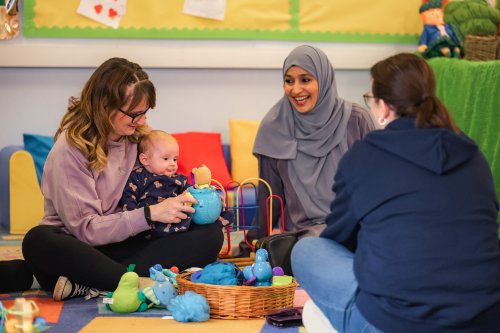 a group of parents sitting together