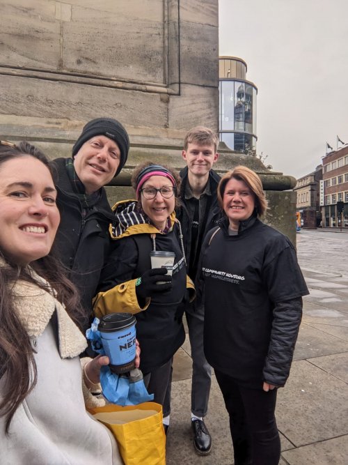 Group out people beside Greys Monument in Newcastle City Centre