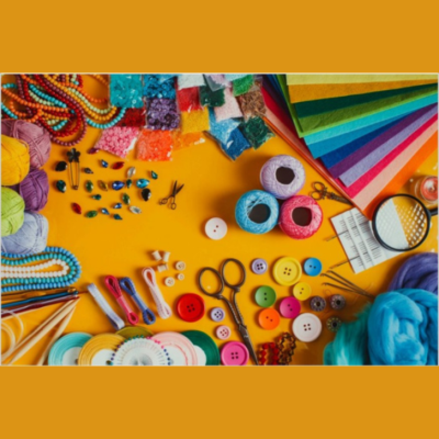 a mixture of craft supplies arranged on a service