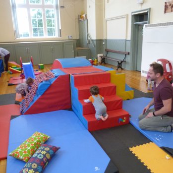 Toddlers and parents inside of the Toddler group