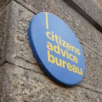 Citizens advice logo on a sign on the side of a building