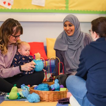 a group of parents sitting together